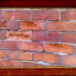 Spalled Brick on Wall